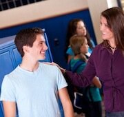 Teacher Talking to Student